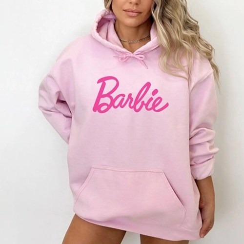 woman Wearing Light Pink Barbie Hoodie featuring hot pink cursive script logo across the chest woman Wearing Light Pink Barbie Hoodie featuring hot pink cursive script logo across the chest