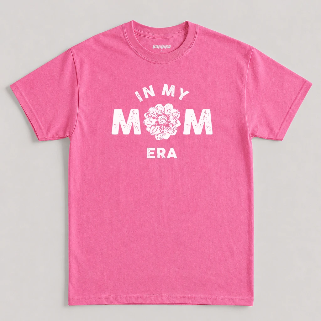 Azalea Pink In My Mom Era T-Shirt featuring a white distressed floral graphic