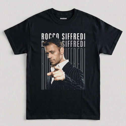 Rocco Siffredi Don't Be Shy graphic t-shirt featuring pointing portrait photo design in pinstripe suit on black cotton tee