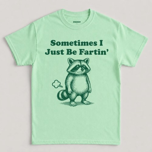 Mint Green Funny Raccoon Shirt featuring a vintage raccoon illustration with the "Sometimes I Just Be Fartin'" graphic design