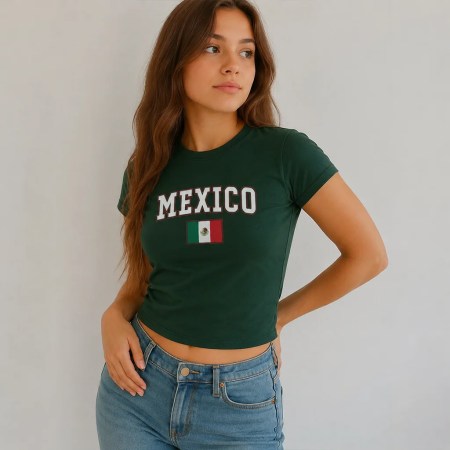 Model Wearing Forest green Mexico women's baby tee, vintage Y2K women's fitted soccer shirt with bold arched typography and Mexican flag design