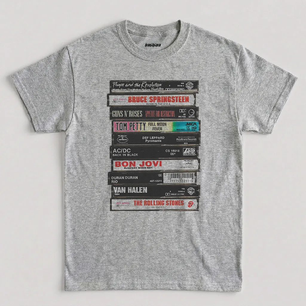 Sport Grey Classic Rock Cassette Tape T Shirt featuring a stacked album spine graphic with iconic rock band names and titles