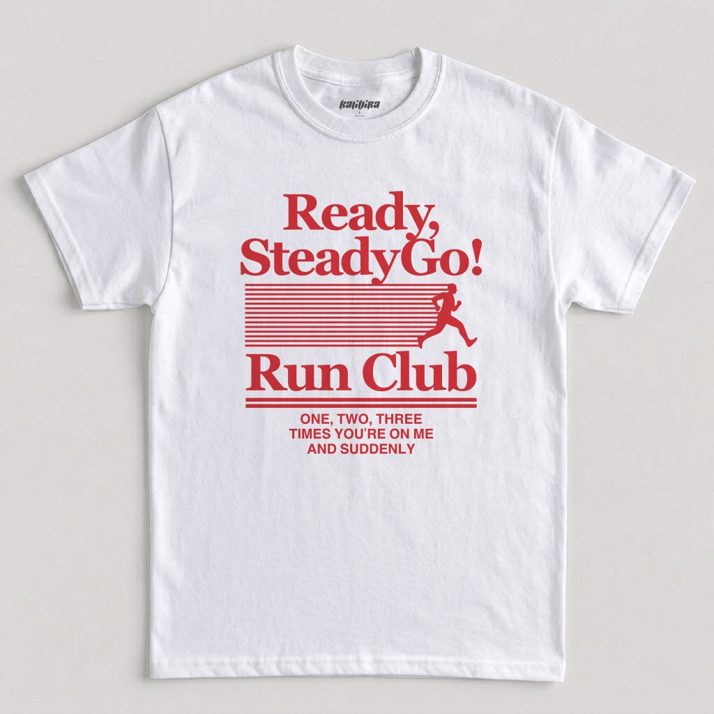 White Ready Steady Go Run Club shirt featuring a retro runner graphic, bold typography, and Harry Styles-inspired music design